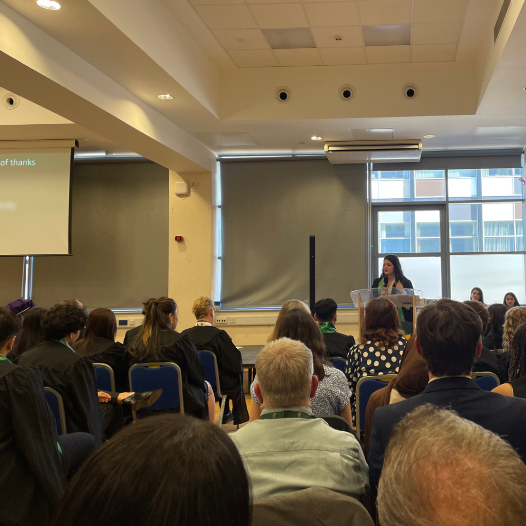 A picture of graduate Marena giving her speech