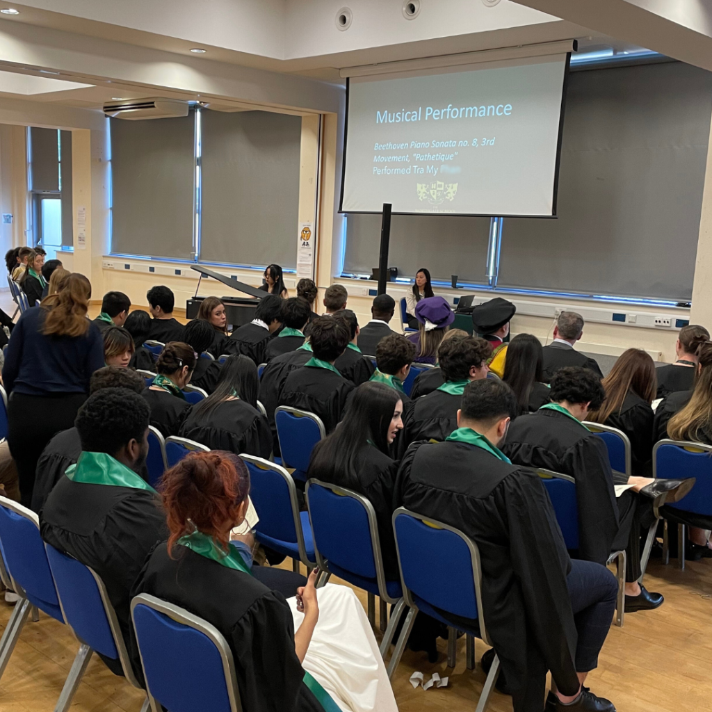 A picture of Tra My playing her piano composition.