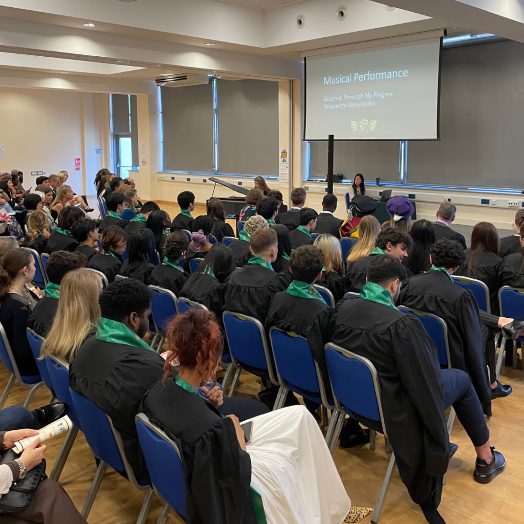 A picture of a student performing at the Worthgate Graduation ceremony